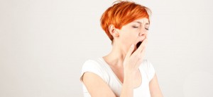 yawning woman in the morning holding a toothbrush; Shutterstock ID 94825978; PO: The Huffington Post; Job: The Huffington Post; Client: The Huffington Post; Other: The Huffington Post